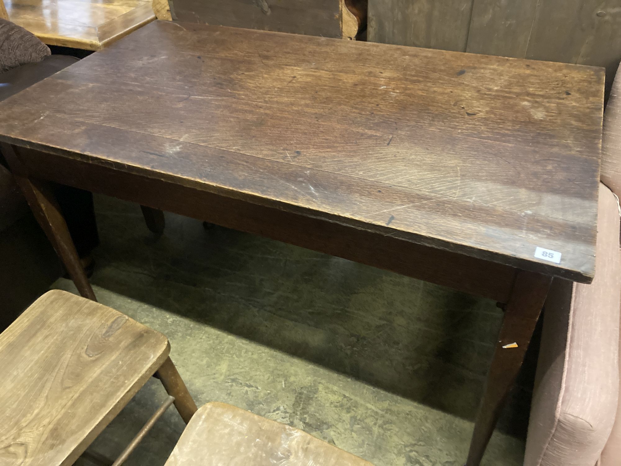 A late Victorian rectangular oak table, width 122cm, depth 69cm, height 74cm together with four church chairs